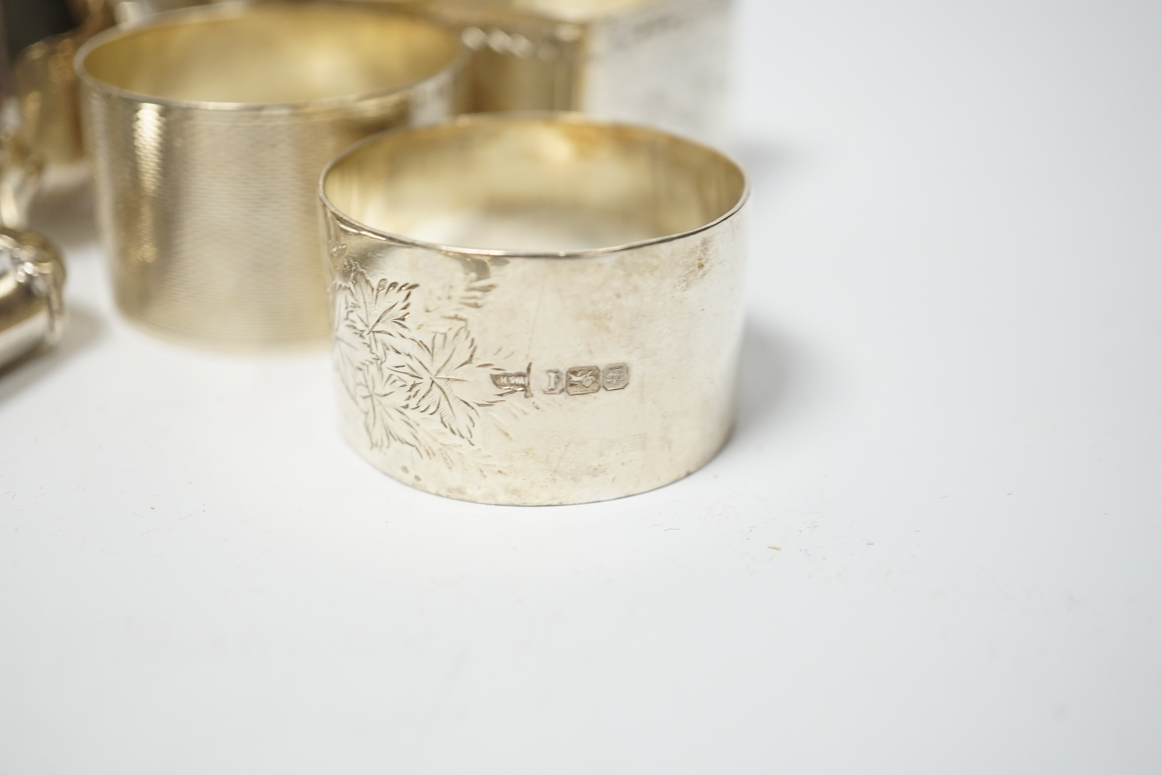 Sundry small silver including a pair of Victorian salts, condiments, napkin rings and an unusual flask?